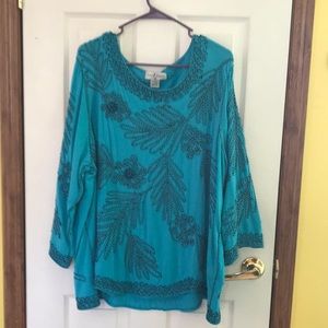 Blue top with black stitching